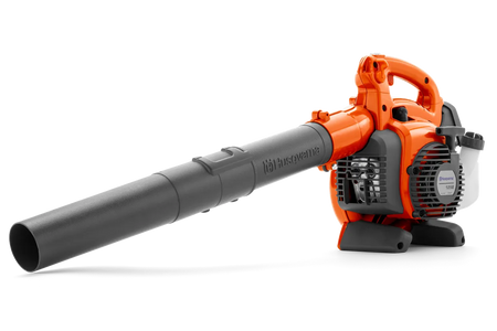 Husqvarna 125B benzinløvblæser – Set fra siden af en Husqvarna-løvblæser med ergonomisk håndtag og synlig brændstoftank.