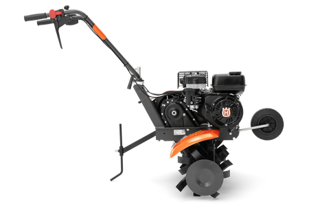 Husqvarna TF 335 havefræser – 80 cm – Set fra siden af en Husqvarna-fræser med synlig motor og håndtag.
